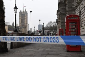 A police security cordon remains around the Houses of Parliament on March 23, 2017 in London.