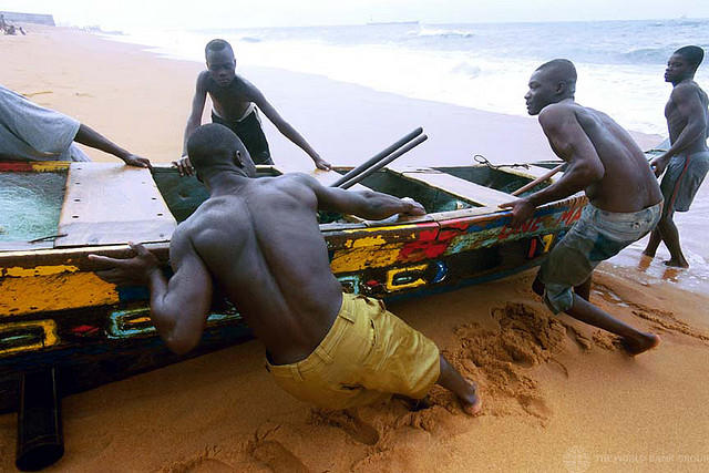 Fishermen with their boat